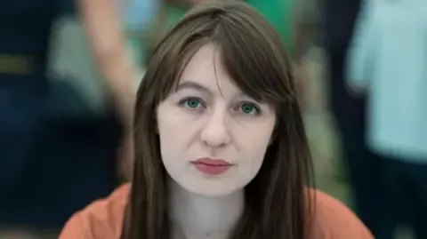 Irish author Sally Rooney declares she cannot visit the UK due to potential arrest